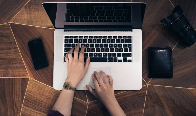 Photo of a woman using a laptop